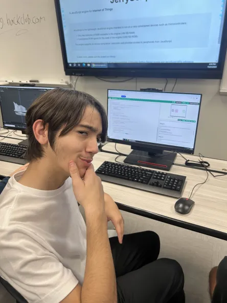Gio working on his sprig game at a Meeting.